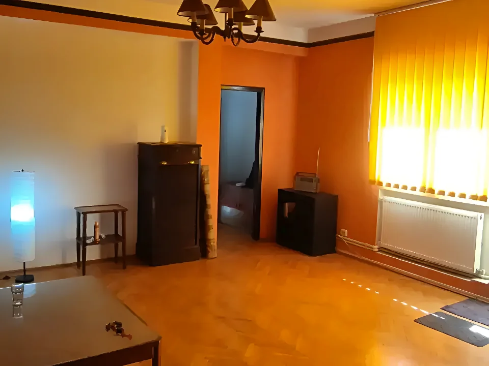 Apartament de inchiriere Sector 5 Bucuresti living portocaliu